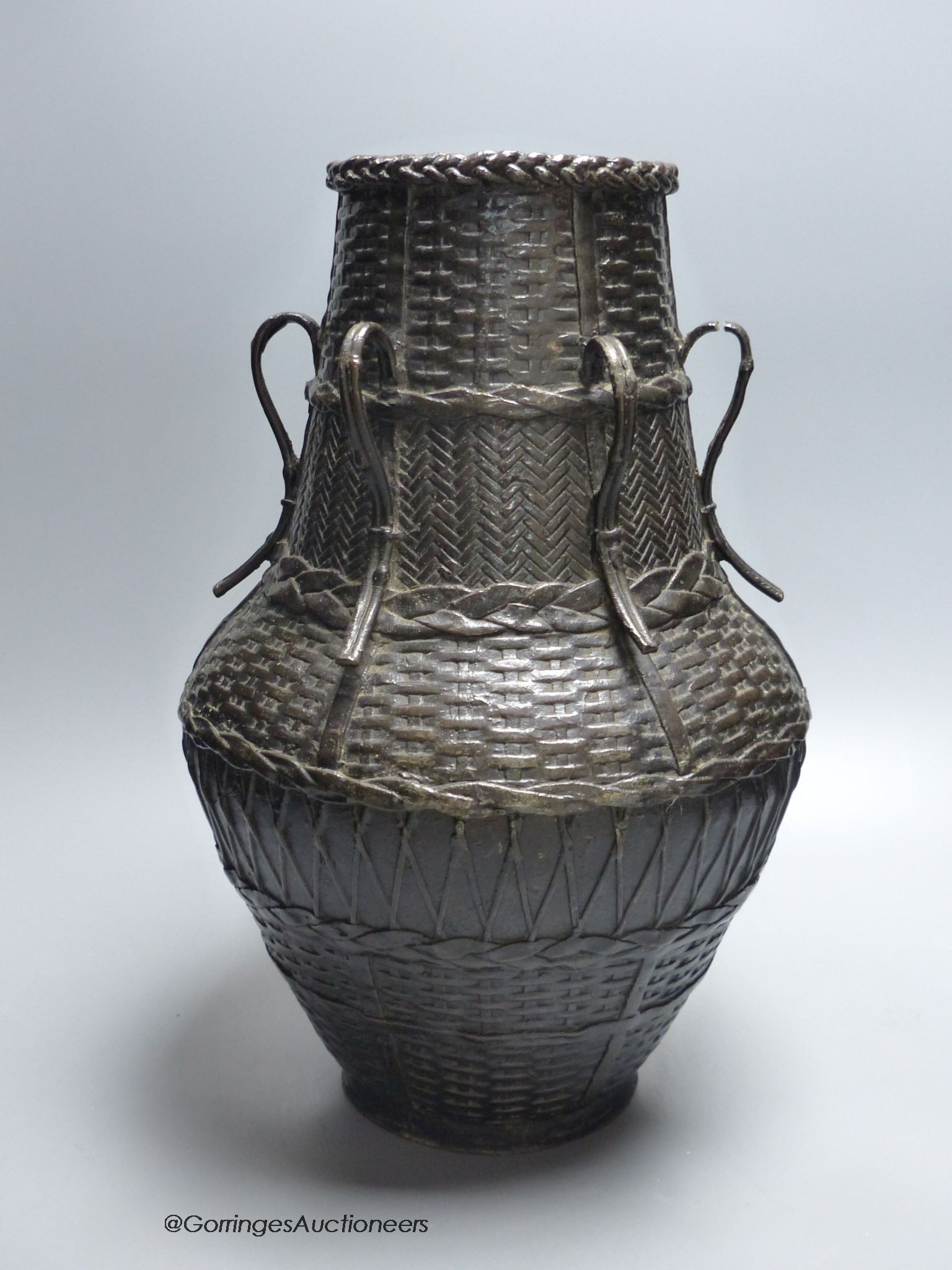 A large Japanese bronze basket effect ikebana vase, Meiji period 36cm